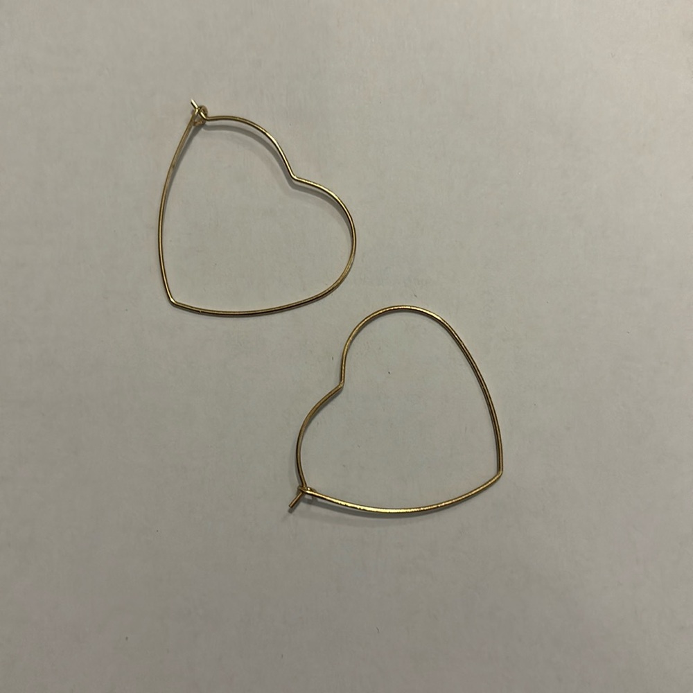 Gold heart shaped hoops